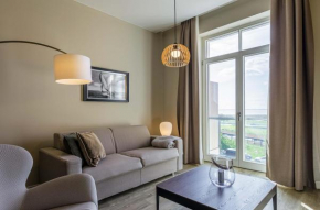 Ostseeglück - 5-Sterne-Ferienwohnung mit Südbalkon und Blick zum Saaler Bodden in Wustrow